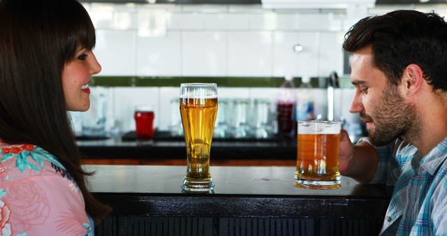 Couple Enjoying Beer Together in Cafe - Download Free Stock Images Pikwizard.com