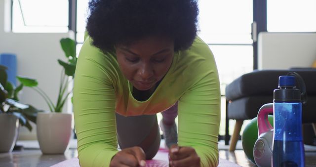 African American Woman Performing Plank Exercise at Home - Download Free Stock Images Pikwizard.com