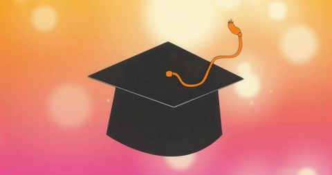 Floating graduation cap with orange tassel on warm gradient background for celebration