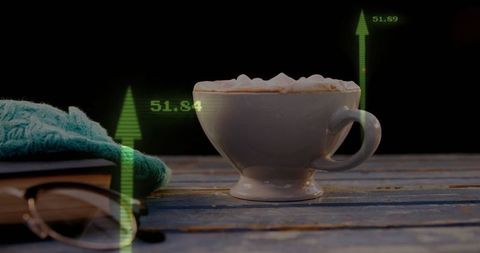 Coffee Cup with Data Projections on Rustic Desk