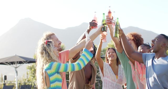 Group of Friends Celebrating Outdoors with Drinks on Sunny Day - Download Free Stock Images Pikwizard.com