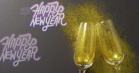 Festive new year celebration with glitter champagne glasses