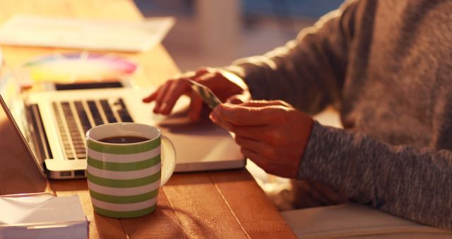 Person Shopping Online with Laptop and Coffee - Download Free Stock Images Pikwizard.com