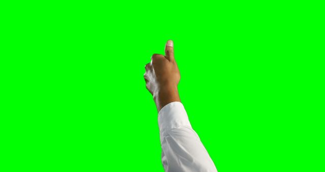 Hand showing thumbs up gesture against vibrant green screen background conveys positivity and approval. Ideal for promotions, advertisements, agreements, success stories, and various graphical projects requiring a positive symbol. Easily edited due to the green screen.