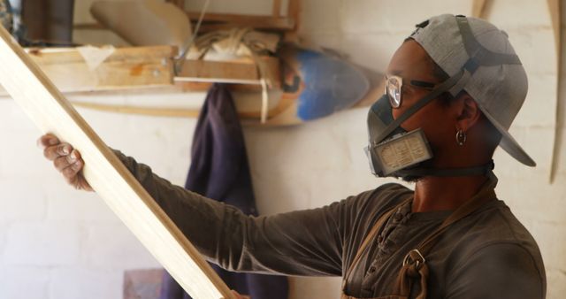 Carpenter Measuring Wooden Plank in Workshop - Download Free Stock Images Pikwizard.com