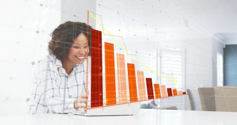 Smiling woman data analyzing on laptop with visual graphics