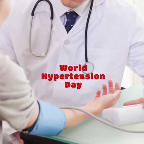 doctor measuring blood pressure for world hypertension day - Download Free Stock Templates Pikwizard.com