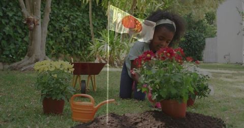 Young Girl Planting in Backyard Garden with Potted Flowers and Tools