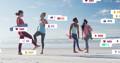 Group of diverse women practicing yoga on beach with social engagement icons