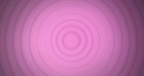 Pink concentric ring wall panel featuring bullseye geometry minimalist decorative sculpture