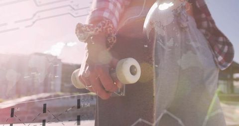 Vibrant urban skater with skateboard in sunlit skate park