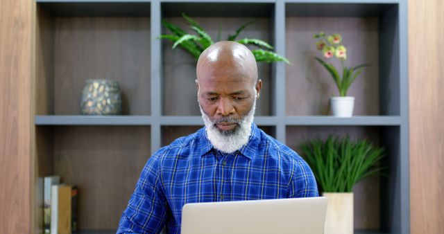Senior African American Man Working on Laptop in Modern Home Office - Download Free Stock Images Pikwizard.com
