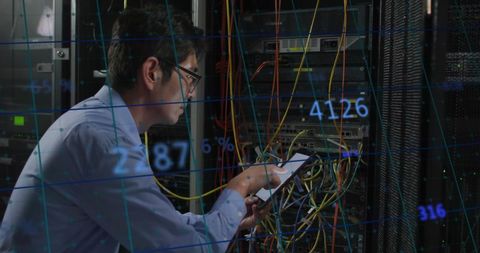 Technician Managing Server Network Solutions - Download Free Stock Images Pikwizard.com