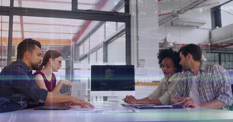 Multicultural team collaborating around conference table with digital data overlay
