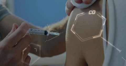 Clinician preparing vaccine injection into upper arm with holographic medical interface