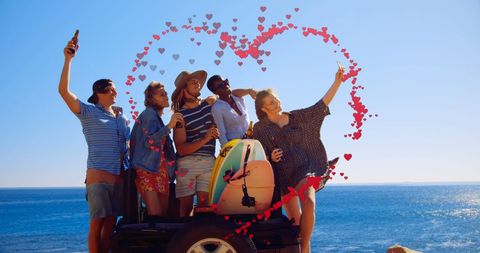 Friends on Beach Getaway Enjoying Road Trip and Taking Selfie