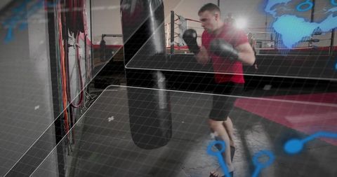 Boxer training on heavy bag with digital overlay and motion blur, fitness tech concept