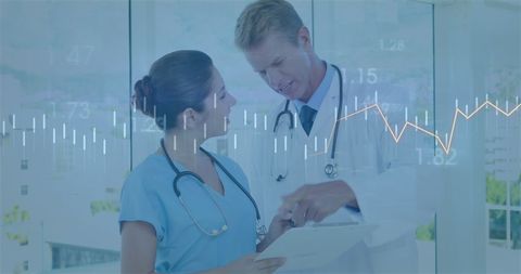 Healthcare professionals analyzing data during a meeting