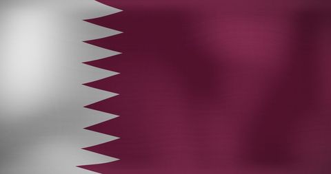 Waving qatar national flag blowing in the wind