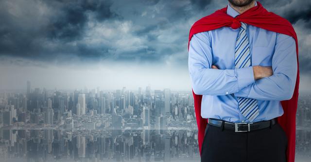 Confident businessman dressed in formal attire with a red cape draped over his shoulders standing with arms crossed against a city skyline under dramatic, cloudy skies. Ideal for promoting business success, leadership qualities, professional growth, empowerment in the workplace, and ambitious career-driven themes.