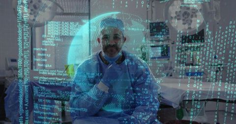 Doctor reviewing data in advanced medical imaging facility