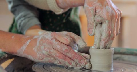 Guiding Hands: Pottery Masterclass in Workshop - Download Free Stock Images Pikwizard.com