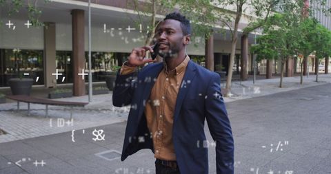 Businessman Discussing Digital Innovation While Walking