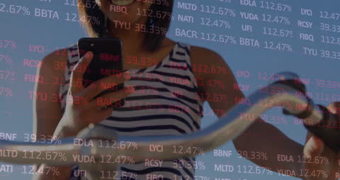 Woman Interacting with Financial Data on Smartphone Screen