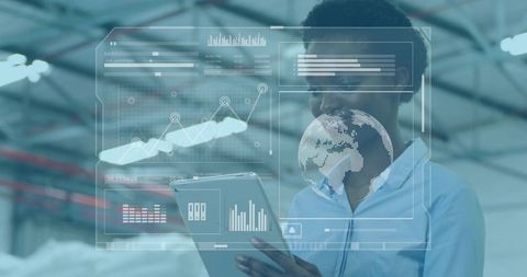 Female technician holding tablet viewing holographic analytics for industrial monitoring