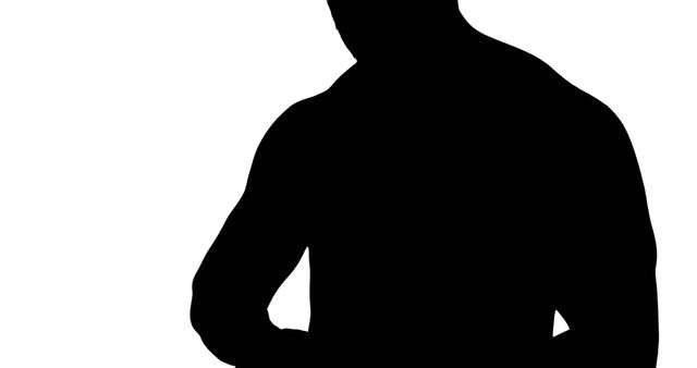 Silhouette of a muscular man in a contemplative pose - Download Free Stock Images Pikwizard.com