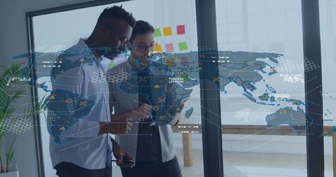 Business Analysts Collaborating with Digital World Map Interface