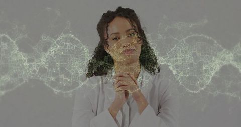 Scientist Analyzing Digital DNA Double Helix Overlay