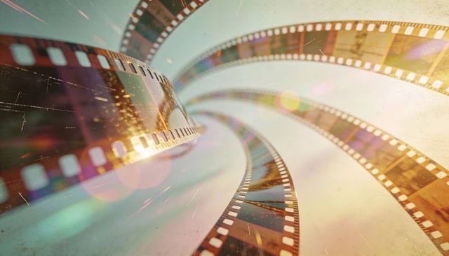 Twisting 35mm film strips spiraling to vanishing point with vintage scratches flares