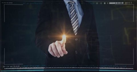 Businessman Activating Futuristic Touch Interface