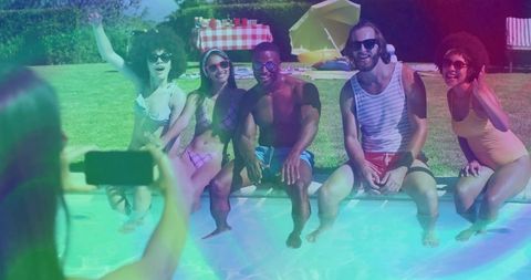 Group of Friends Enjoying Sunny Pool Day Together