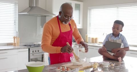 Grandfather and Grandson Baking Together for Quality Family Time - Download Free Stock Images Pikwizard.com