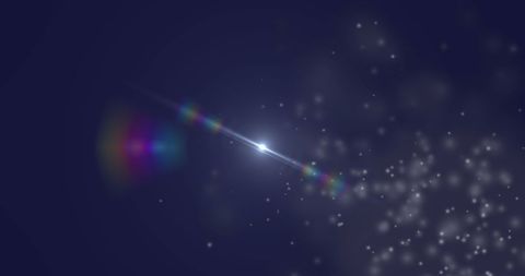 Abstract Light Burst and Sparkles on Black Background