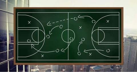 Basketball Game Plan Strategy on Chalkboard with Cityscape Background