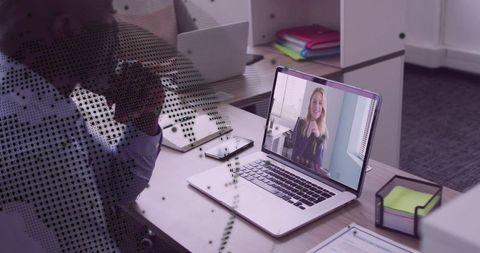 Professional Virtual Meeting in Modern Office Workspace