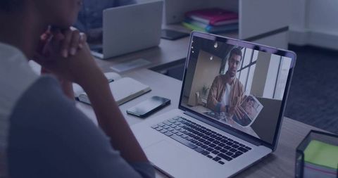 Remote Work Collaboration via Video Conference on Laptop