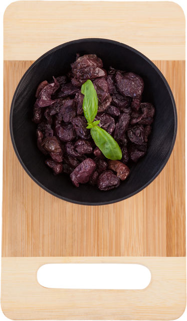 Transparent Bowl of Dried Olives on Cutting Board with Fresh Basil - Download Free Stock Videos Pikwizard.com