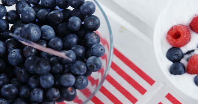 Fresh Blueberries in a Bowl with Raspberries and Yogurt - Download Free Stock Images Pikwizard.com