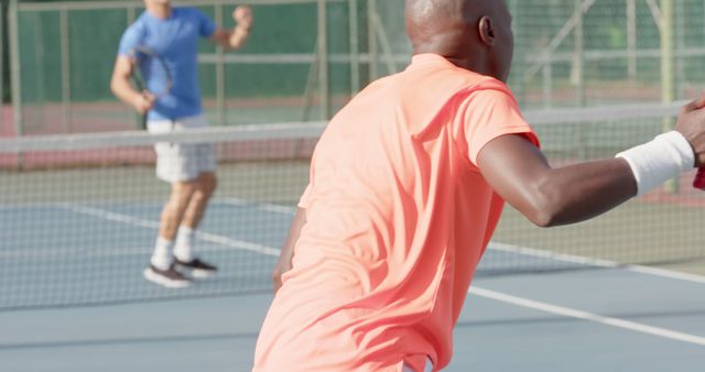 Two Friends Playing Tennis Match on Outdoor Court - Download Free Stock Images Pikwizard.com