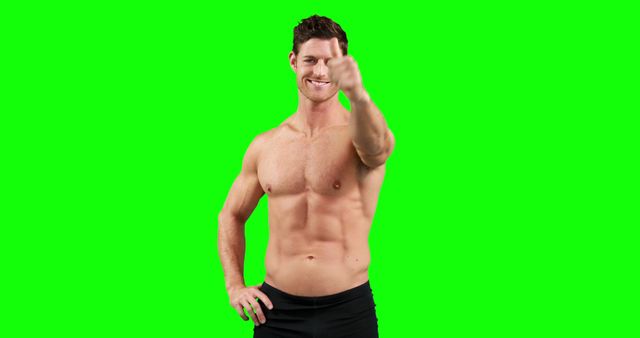 Smiling Fit Man Giving Thumbs-Up Gesture on Green Screen Background - Download Free Stock Images Pikwizard.com