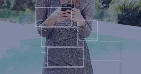 Glamorous Woman in Metallic Dress Texting by Poolside