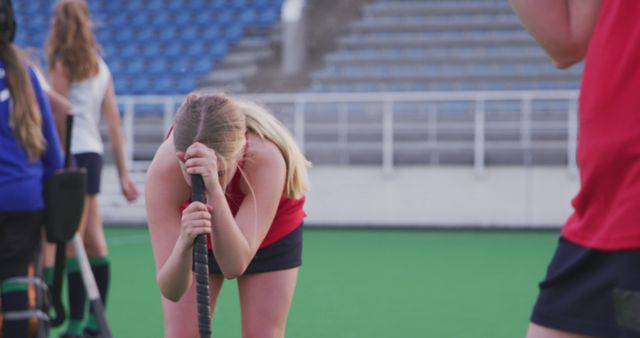 Female Field Hockey Player Resting During Training Session - Download Free Stock Images Pikwizard.com