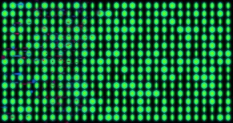 Green glowing light pattern on black background