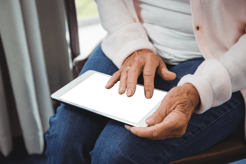 Senior Woman Using Digital Tablet with Transparent Screen - Download Free Stock Videos Pikwizard.com