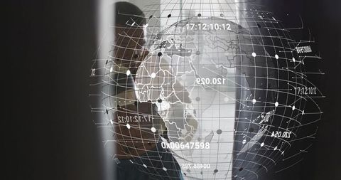 Businessman using smartphone interacting with holographic global map and real-time data