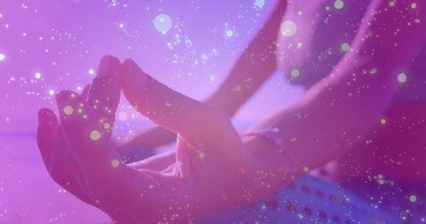 Serene Yoga Pose on Beach with Sparkling Light Effects